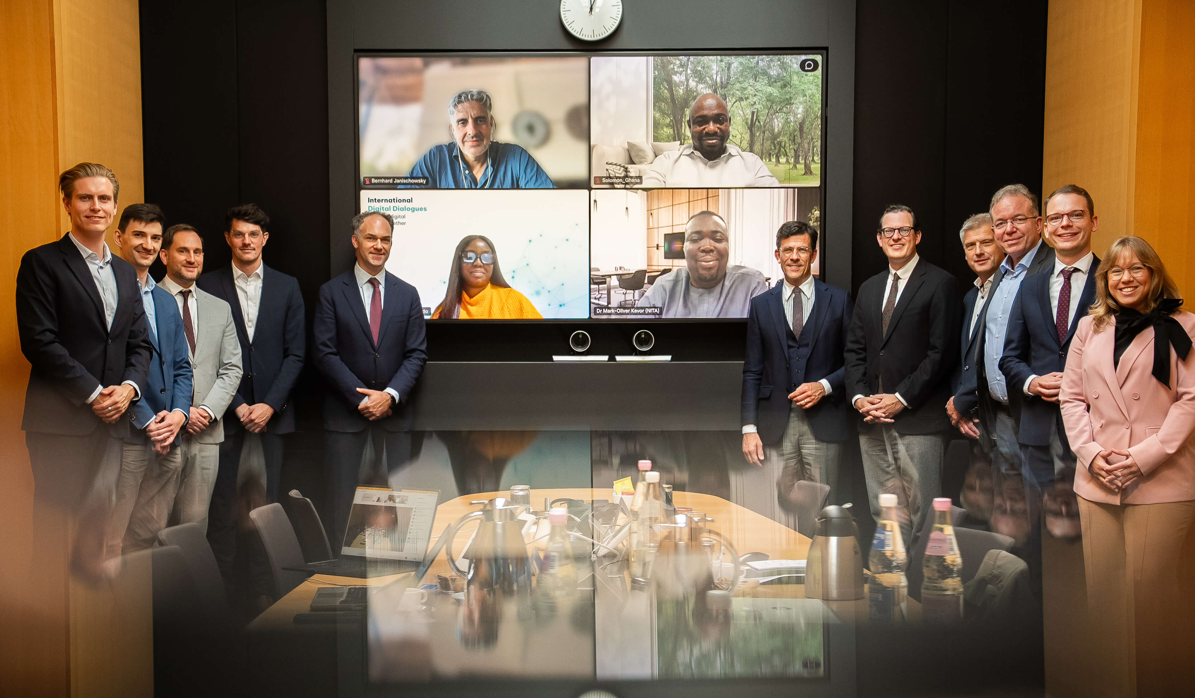 BMDS representatives standing in front of a screen showing the Ghanaian representatives